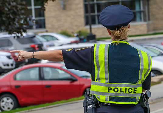 Policewoman directing traffic
