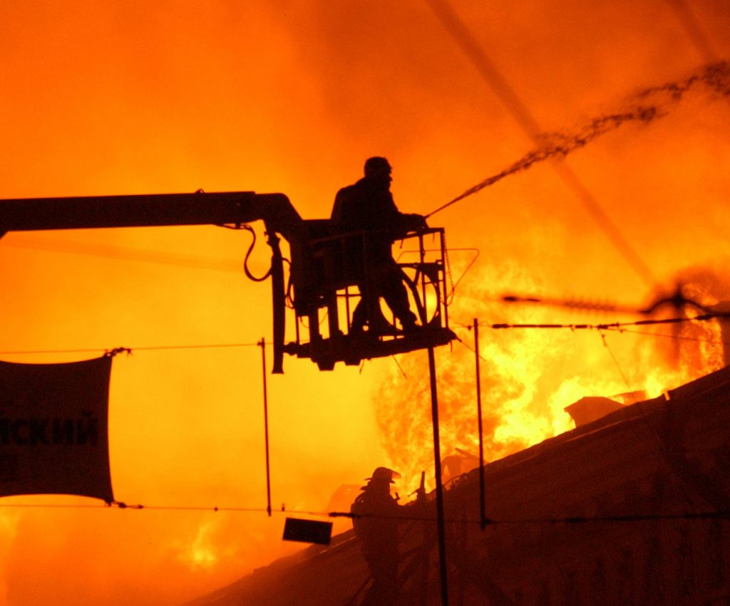 Fireman near overhead lines